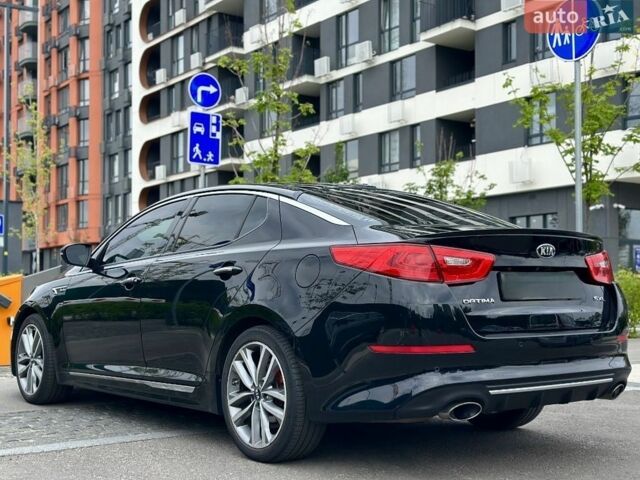 Чорний Кіа Оптіма, об'ємом двигуна 2 л та пробігом 159 тис. км за 13700 $, фото 5 на Automoto.ua