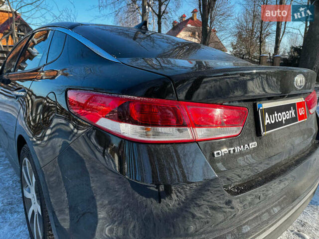 Чорний Кіа Оптіма, об'ємом двигуна 2.4 л та пробігом 154 тис. км за 10490 $, фото 9 на Automoto.ua