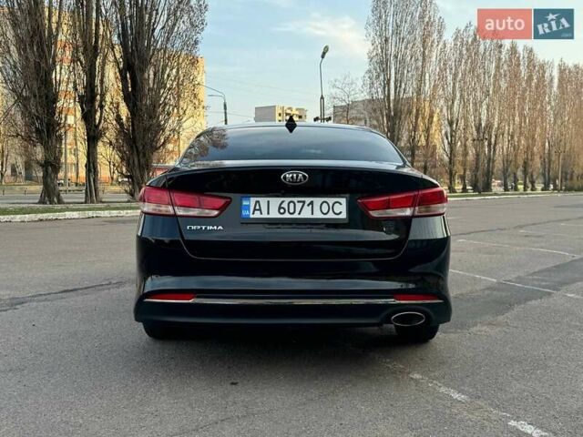Черный Киа Оптима, объемом двигателя 2.36 л и пробегом 124 тыс. км за 11300 $, фото 18 на Automoto.ua