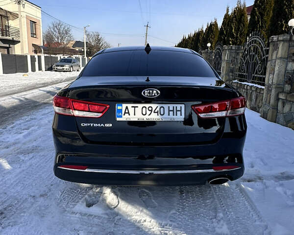 Черный Киа Оптима, объемом двигателя 2.36 л и пробегом 236 тыс. км за 10500 $, фото 4 на Automoto.ua