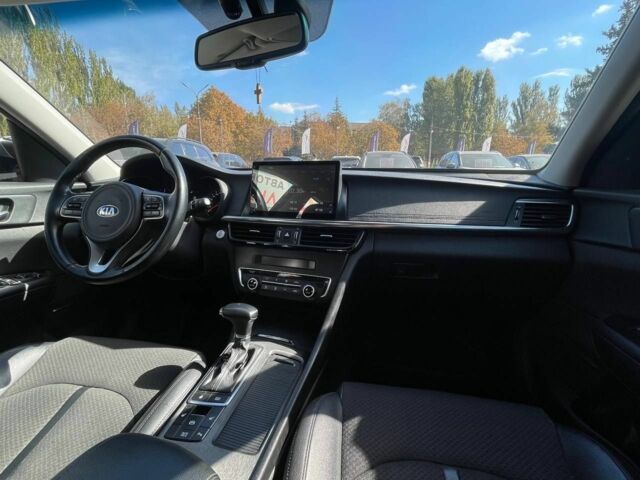 Чорний Кіа Оптіма, об'ємом двигуна 1.7 л та пробігом 128 тис. км за 13500 $, фото 11 на Automoto.ua