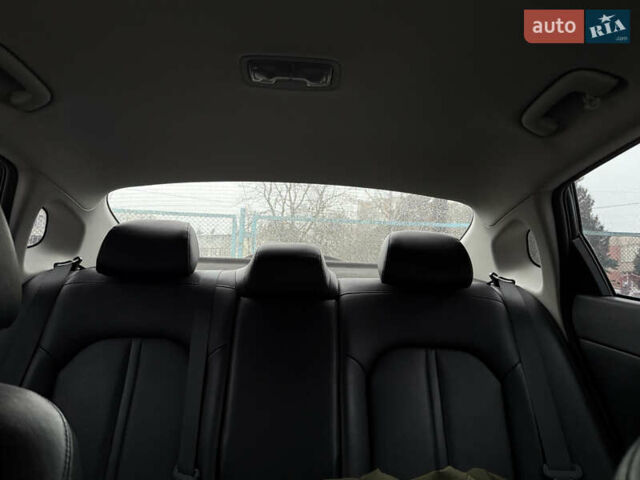 Черный Киа Оптима, объемом двигателя 2.4 л и пробегом 61 тыс. км за 12900 $, фото 12 на Automoto.ua