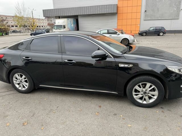 Черный Киа Оптима, объемом двигателя 2 л и пробегом 318 тыс. км за 10800 $, фото 2 на Automoto.ua