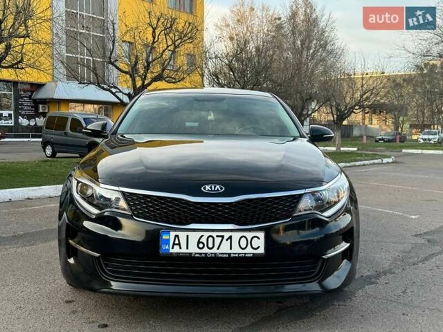 Черный Киа Оптима, объемом двигателя 2.36 л и пробегом 124 тыс. км за 11300 $, фото 1 на Automoto.ua
