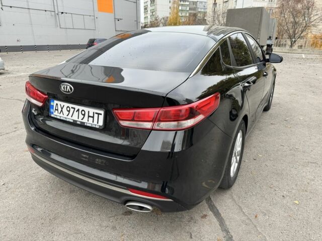 Черный Киа Оптима, объемом двигателя 2 л и пробегом 318 тыс. км за 10800 $, фото 3 на Automoto.ua