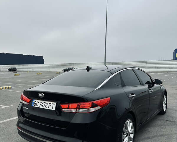 Чорний Кіа Оптіма, об'ємом двигуна 2.36 л та пробігом 230 тис. км за 11500 $, фото 6 на Automoto.ua