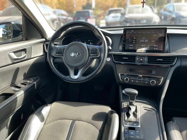 Чорний Кіа Оптіма, об'ємом двигуна 1.7 л та пробігом 128 тис. км за 13500 $, фото 16 на Automoto.ua