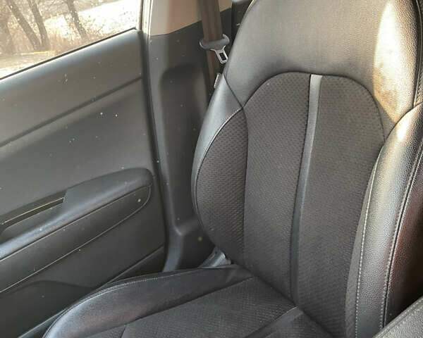 Черный Киа Оптима, объемом двигателя 1.69 л и пробегом 119 тыс. км за 15100 $, фото 6 на Automoto.ua