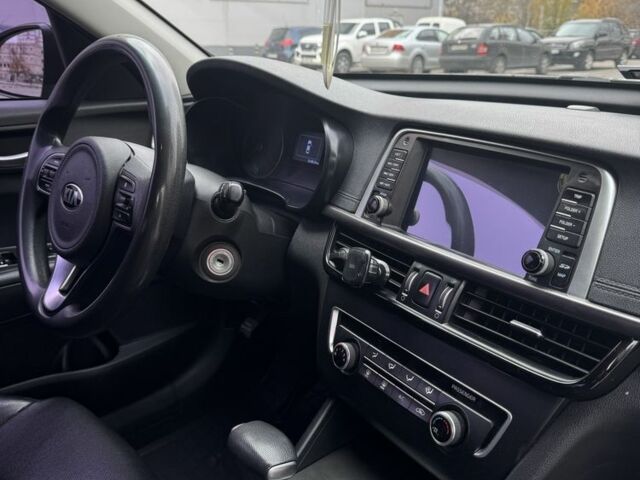 Черный Киа Оптима, объемом двигателя 2 л и пробегом 318 тыс. км за 10800 $, фото 10 на Automoto.ua