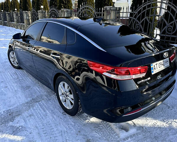 Черный Киа Оптима, объемом двигателя 2.36 л и пробегом 236 тыс. км за 10500 $, фото 5 на Automoto.ua