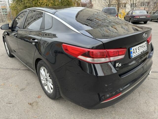 Черный Киа Оптима, объемом двигателя 2 л и пробегом 318 тыс. км за 10800 $, фото 5 на Automoto.ua