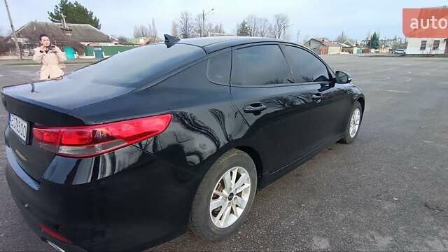 Чорний Кіа Оптіма, об'ємом двигуна 2.36 л та пробігом 186 тис. км за 10500 $, фото 1 на Automoto.ua