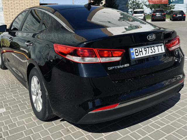 Черный Киа Оптима, объемом двигателя 2.4 л и пробегом 144 тыс. км за 10300 $, фото 4 на Automoto.ua