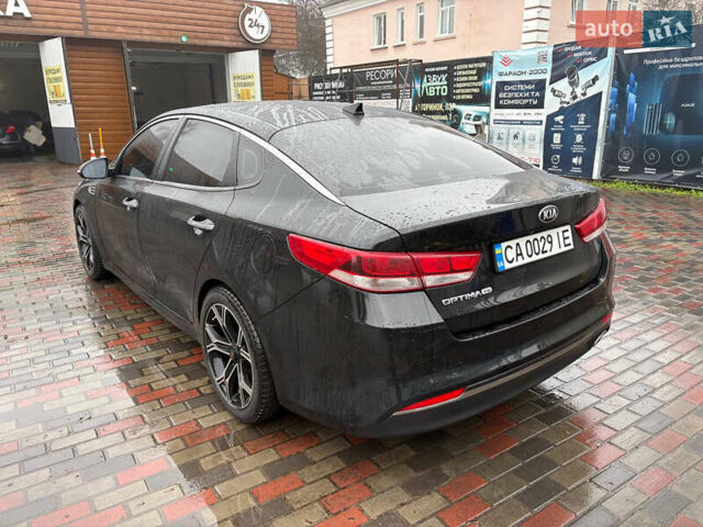 Черный Киа Оптима, объемом двигателя 2.4 л и пробегом 137 тыс. км за 11000 $, фото 3 на Automoto.ua