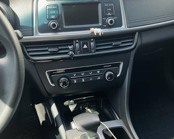 Черный Киа Оптима, объемом двигателя 2.4 л и пробегом 144 тыс. км за 10300 $, фото 8 на Automoto.ua