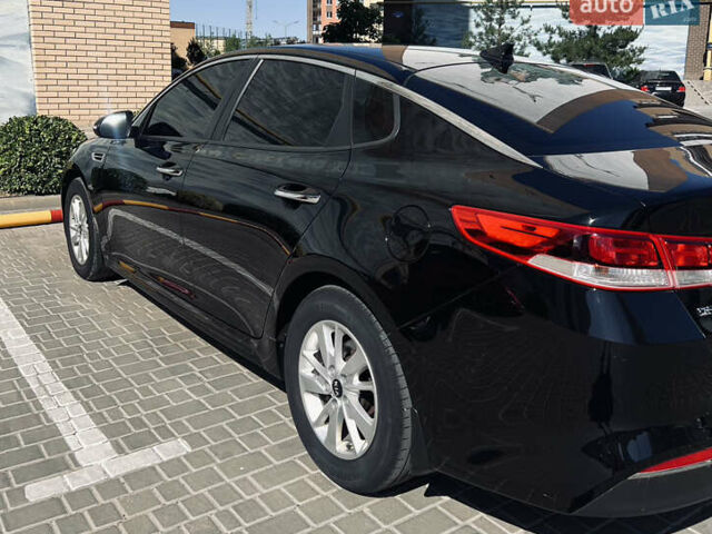 Черный Киа Оптима, объемом двигателя 2.4 л и пробегом 144 тыс. км за 10300 $, фото 3 на Automoto.ua