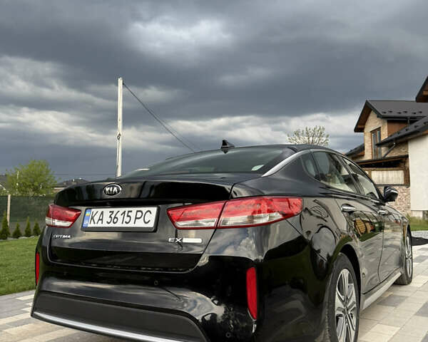 Чорний Кіа Оптіма, об'ємом двигуна 2 л та пробігом 118 тис. км за 16300 $, фото 3 на Automoto.ua
