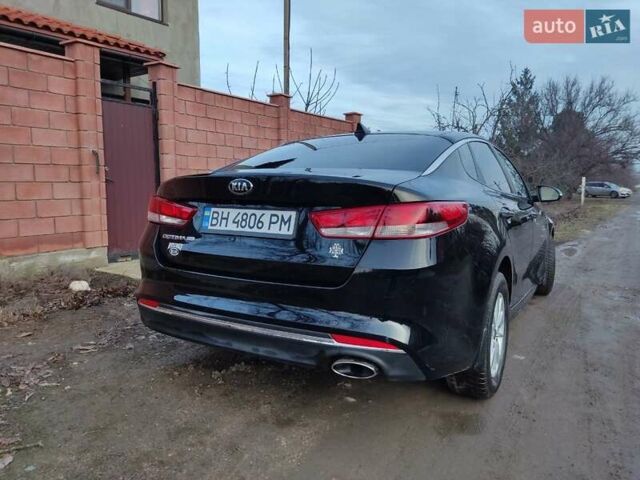 Черный Киа Оптима, объемом двигателя 2.36 л и пробегом 150 тыс. км за 10800 $, фото 4 на Automoto.ua