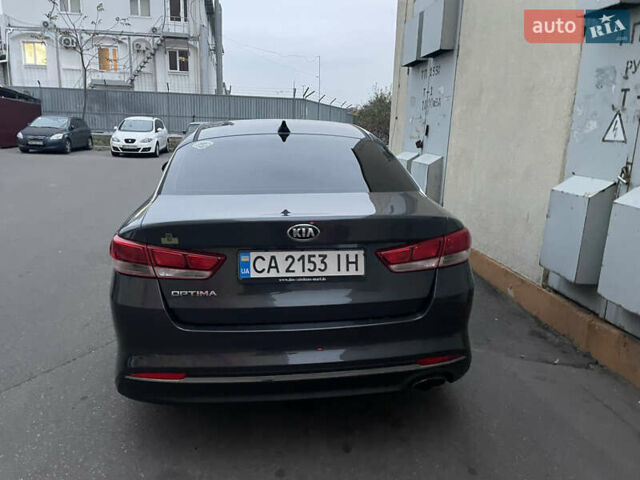 Черный Киа Оптима, объемом двигателя 2.36 л и пробегом 130 тыс. км за 9600 $, фото 3 на Automoto.ua