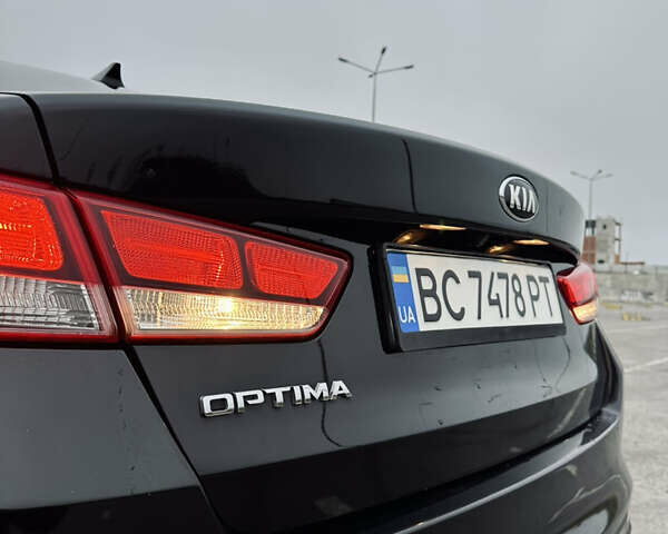 Чорний Кіа Оптіма, об'ємом двигуна 2.36 л та пробігом 230 тис. км за 11500 $, фото 9 на Automoto.ua