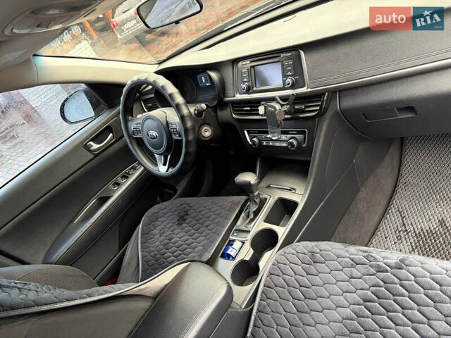 Черный Киа Оптима, объемом двигателя 2.4 л и пробегом 137 тыс. км за 11000 $, фото 7 на Automoto.ua