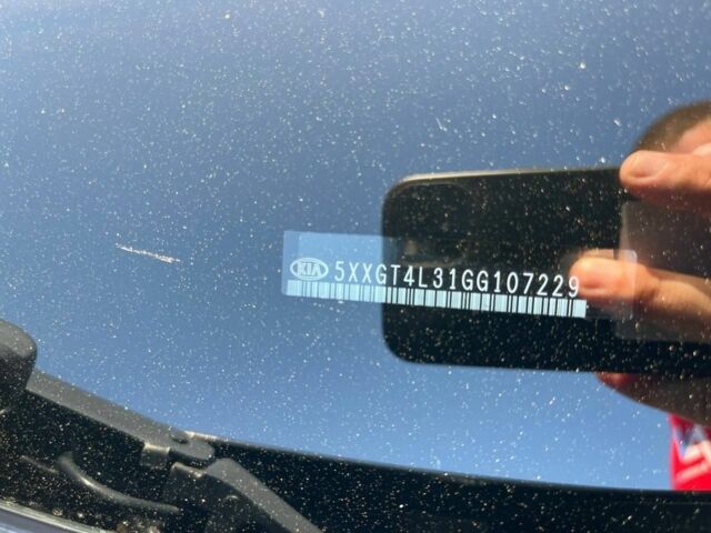 Чорний Кіа Оптіма, об'ємом двигуна 2 л та пробігом 187 тис. км за 9414 $, фото 22 на Automoto.ua
