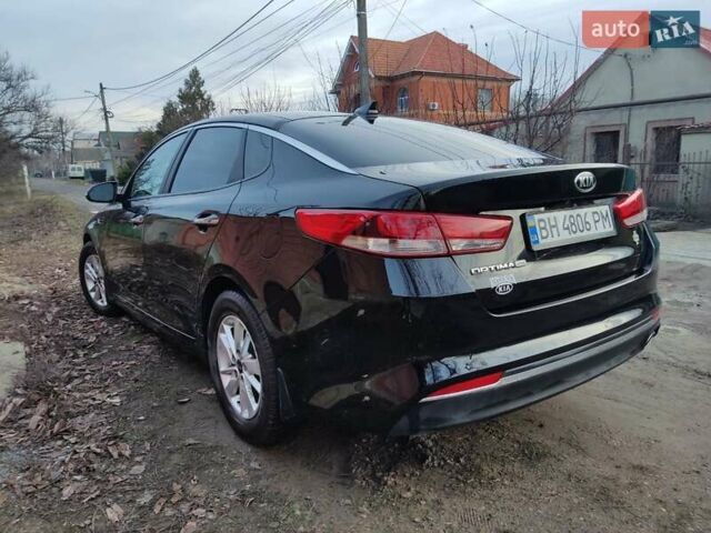 Черный Киа Оптима, объемом двигателя 2.36 л и пробегом 150 тыс. км за 10800 $, фото 5 на Automoto.ua
