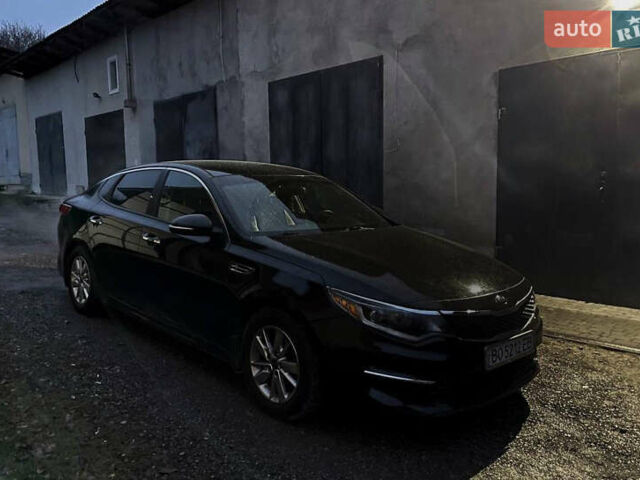 Черный Киа Оптима, объемом двигателя 2.36 л и пробегом 110 тыс. км за 10400 $, фото 1 на Automoto.ua