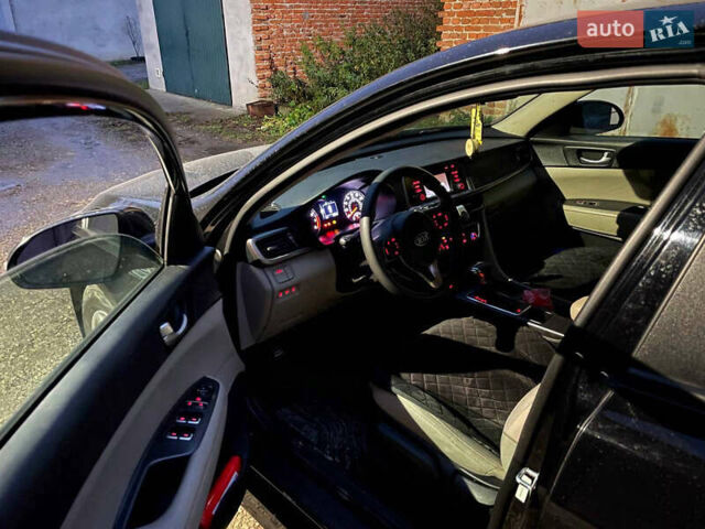 Черный Киа Оптима, объемом двигателя 2.36 л и пробегом 110 тыс. км за 10400 $, фото 6 на Automoto.ua