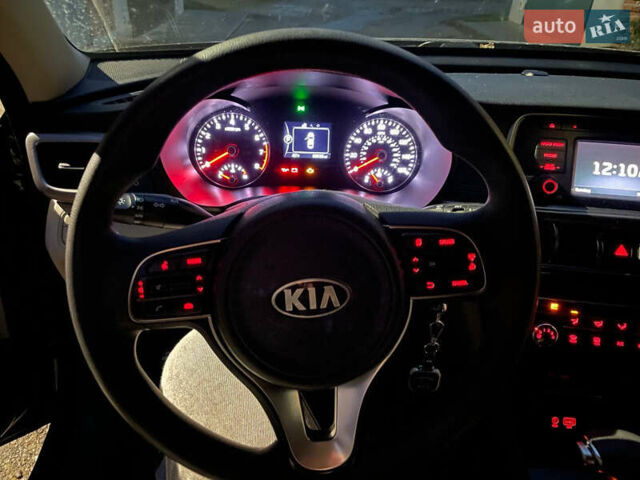 Черный Киа Оптима, объемом двигателя 2.36 л и пробегом 110 тыс. км за 10400 $, фото 9 на Automoto.ua