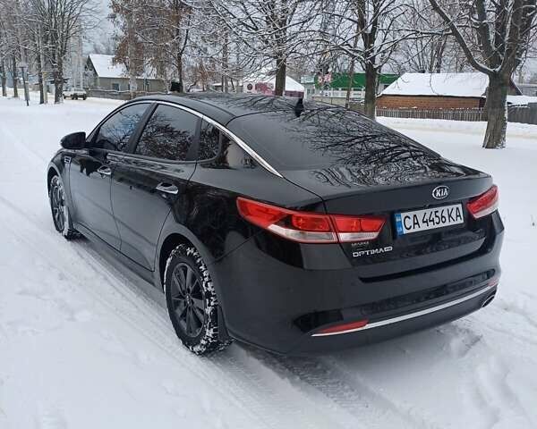 Чорний Кіа Оптіма, об'ємом двигуна 2.4 л та пробігом 115 тис. км за 11000 $, фото 8 на Automoto.ua