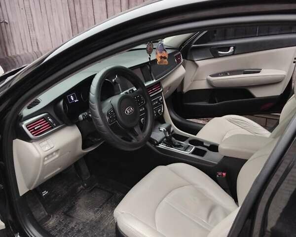 Черный Киа Оптима, объемом двигателя 2.4 л и пробегом 113 тыс. км за 11700 $, фото 12 на Automoto.ua