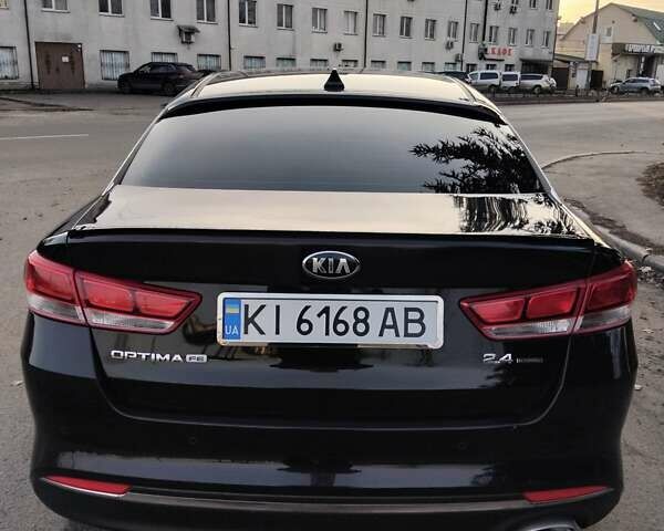 Черный Киа Оптима, объемом двигателя 2.4 л и пробегом 113 тыс. км за 11700 $, фото 7 на Automoto.ua