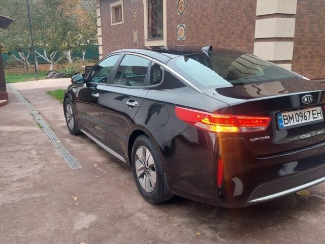Черный Киа Оптима, объемом двигателя 2 л и пробегом 94 тыс. км за 330 $, фото 4 на Automoto.ua