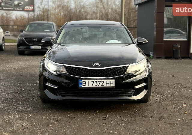 Чорний Кіа Оптіма, об'ємом двигуна 2.4 л та пробігом 129 тис. км за 10300 $, фото 1 на Automoto.ua