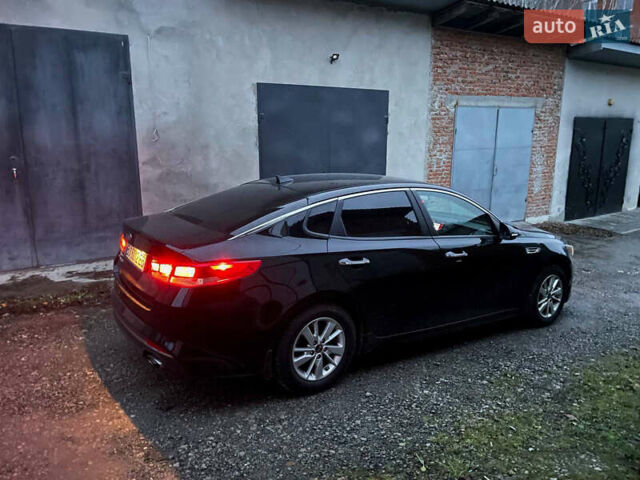 Черный Киа Оптима, объемом двигателя 2.36 л и пробегом 110 тыс. км за 10400 $, фото 5 на Automoto.ua