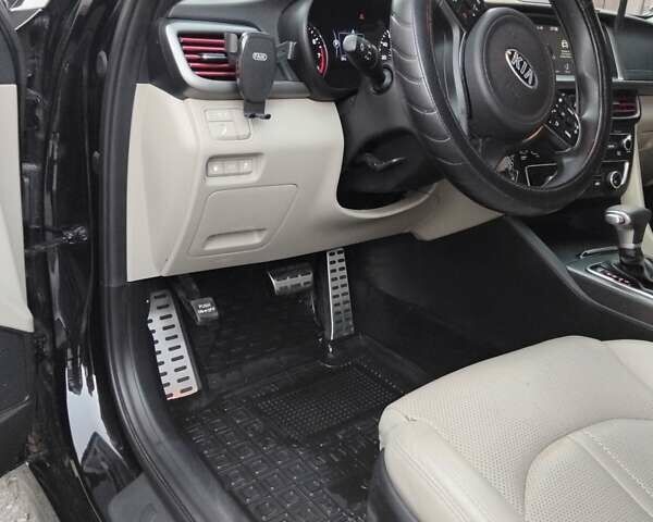 Черный Киа Оптима, объемом двигателя 2.4 л и пробегом 113 тыс. км за 11700 $, фото 10 на Automoto.ua