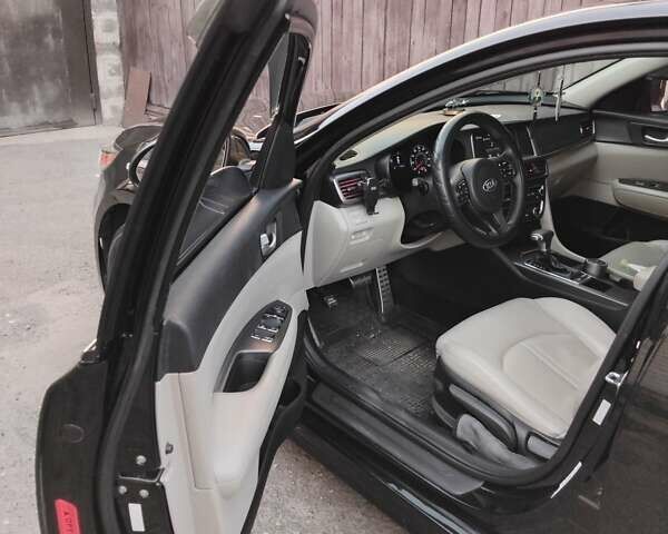 Черный Киа Оптима, объемом двигателя 2.4 л и пробегом 113 тыс. км за 11700 $, фото 11 на Automoto.ua