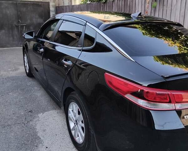 Черный Киа Оптима, объемом двигателя 2.4 л и пробегом 113 тыс. км за 11700 $, фото 4 на Automoto.ua