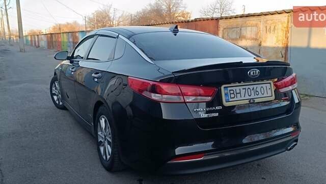Черный Киа Оптима, объемом двигателя 2.36 л и пробегом 135 тыс. км за 13300 $, фото 2 на Automoto.ua