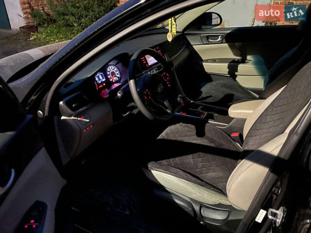 Черный Киа Оптима, объемом двигателя 2.36 л и пробегом 110 тыс. км за 10400 $, фото 12 на Automoto.ua