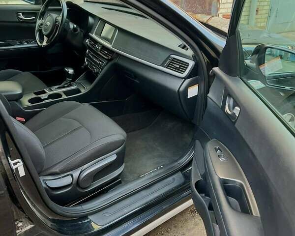 Черный Киа Оптима, объемом двигателя 2 л и пробегом 94 тыс. км за 14100 $, фото 12 на Automoto.ua