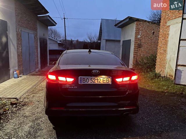 Черный Киа Оптима, объемом двигателя 2.36 л и пробегом 110 тыс. км за 10400 $, фото 3 на Automoto.ua