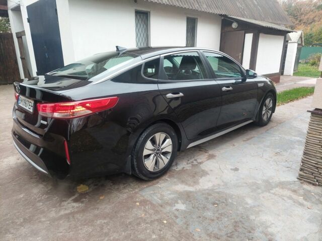 Черный Киа Оптима, объемом двигателя 2 л и пробегом 94 тыс. км за 330 $, фото 3 на Automoto.ua