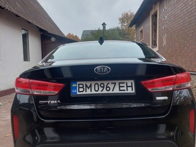 Черный Киа Оптима, объемом двигателя 2 л и пробегом 94 тыс. км за 330 $, фото 1 на Automoto.ua