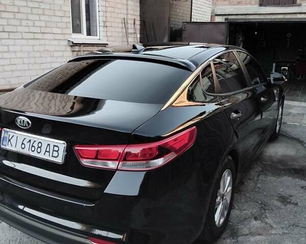 Черный Киа Оптима, объемом двигателя 2.4 л и пробегом 113 тыс. км за 11700 $, фото 5 на Automoto.ua