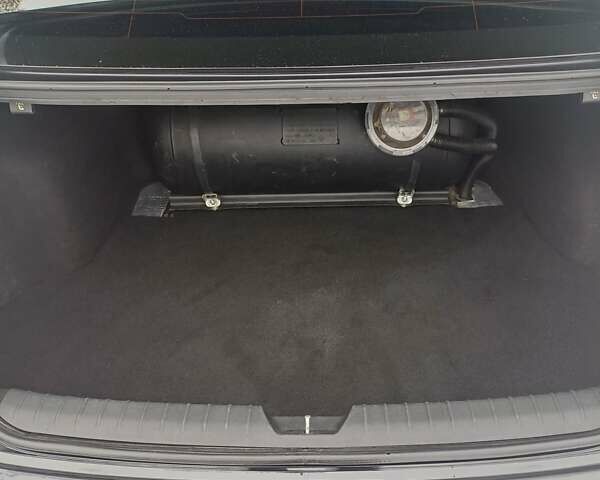 Чорний Кіа Оптіма, об'ємом двигуна 2.4 л та пробігом 115 тис. км за 11000 $, фото 19 на Automoto.ua