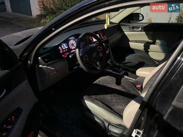 Черный Киа Оптима, объемом двигателя 2.36 л и пробегом 110 тыс. км за 10400 $, фото 11 на Automoto.ua