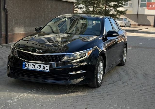 Чорний Кіа Оптіма, об'ємом двигуна 2.36 л та пробігом 107 тис. км за 11500 $, фото 1 на Automoto.ua