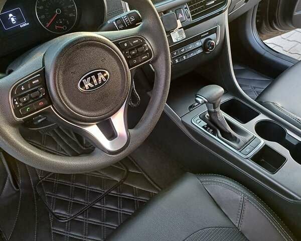 Черный Киа Оптима, объемом двигателя 2.36 л и пробегом 103 тыс. км за 11700 $, фото 32 на Automoto.ua
